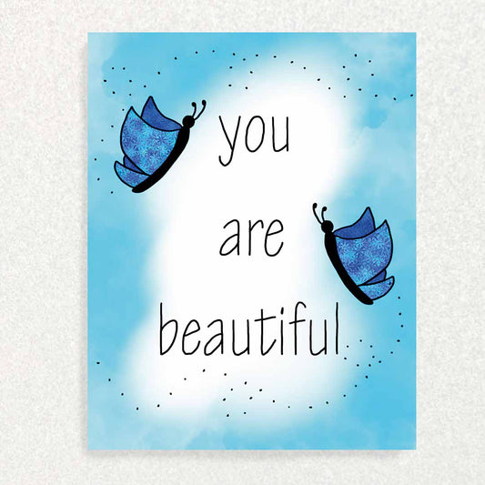 Front of you are beautiful positive affirmation card with butterflies in front of a blue sky