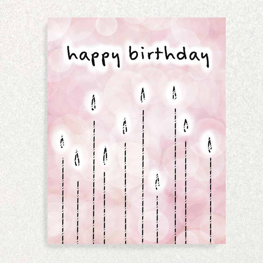 Front of Pink Candles Birthday Keepsake Interview Prompt Card several lit candles with "happy birthday" greeting in front of pastel pink background