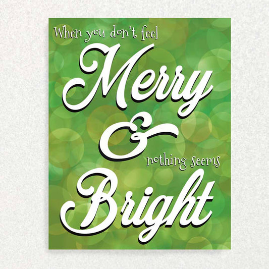 Front of When you don't feel merry and nothing seems bright card dark green with light green text mental health encouragement card