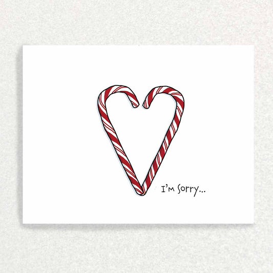 Front of Candy Cane Christmas Card Apology with two candy canes that make a heart